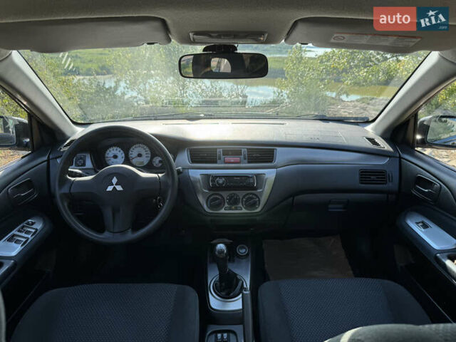 Міцубісі Lancer, об'ємом двигуна 1.6 л та пробігом 126 тис. км за 5799 $, фото 27 на Automoto.ua