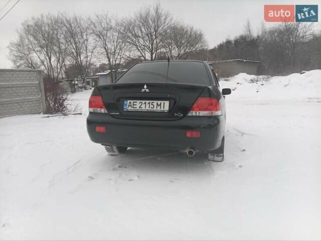 Мицубиси Лансер, объемом двигателя 1.6 л и пробегом 94 тыс. км за 6200 $, фото 2 на Automoto.ua