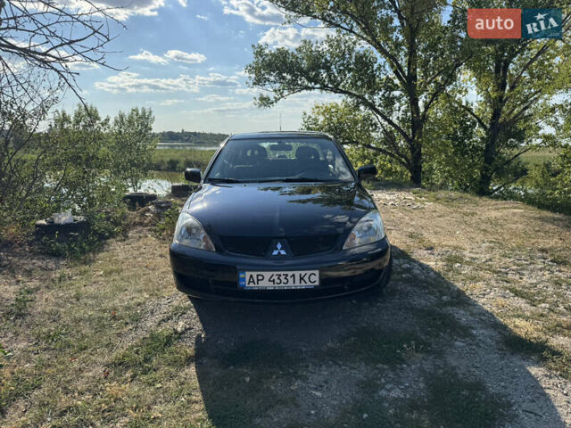 Міцубісі Lancer, об'ємом двигуна 1.6 л та пробігом 126 тис. км за 6199 $, фото 3 на Automoto.ua