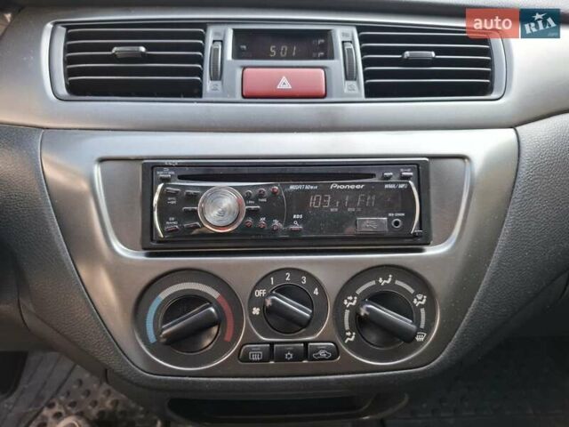 Мицубиси Лансер, объемом двигателя 1.6 л и пробегом 131 тыс. км за 6400 $, фото 11 на Automoto.ua