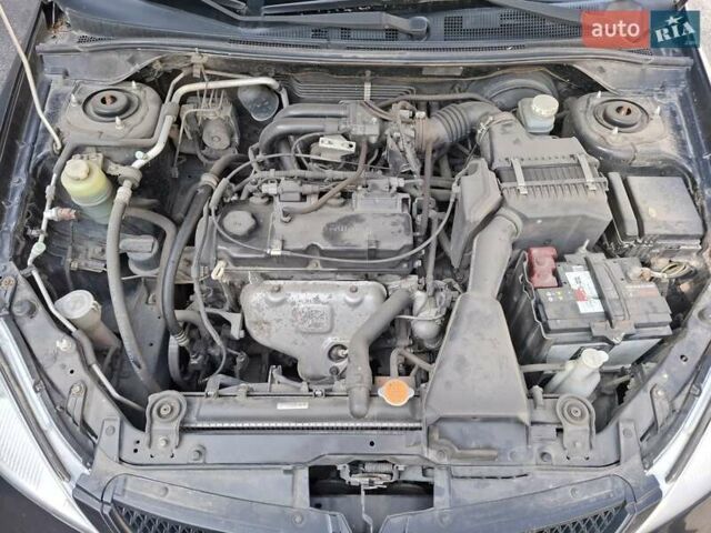 Мицубиси Лансер, объемом двигателя 1.6 л и пробегом 131 тыс. км за 6400 $, фото 13 на Automoto.ua