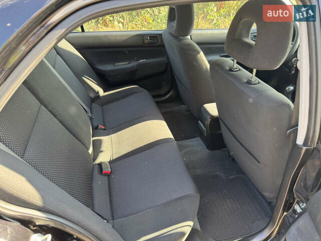 Міцубісі Lancer, об'ємом двигуна 1.6 л та пробігом 126 тис. км за 6199 $, фото 18 на Automoto.ua