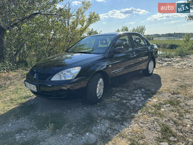 Міцубісі Lancer, об'ємом двигуна 1.6 л та пробігом 126 тис. км за 6199 $, фото 1 на Automoto.ua