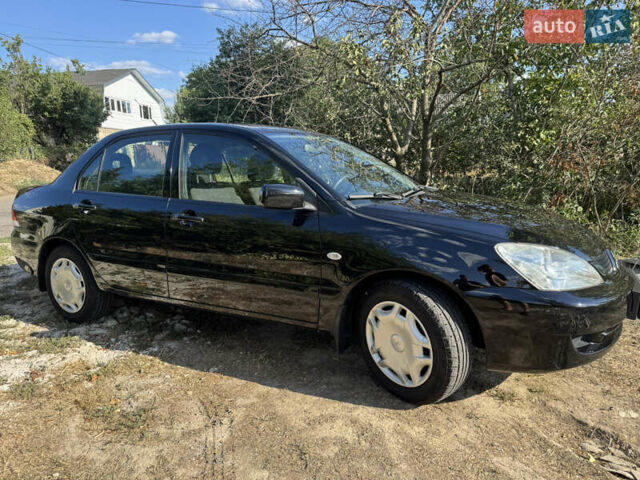 Міцубісі Lancer, об'ємом двигуна 1.6 л та пробігом 126 тис. км за 6199 $, фото 9 на Automoto.ua