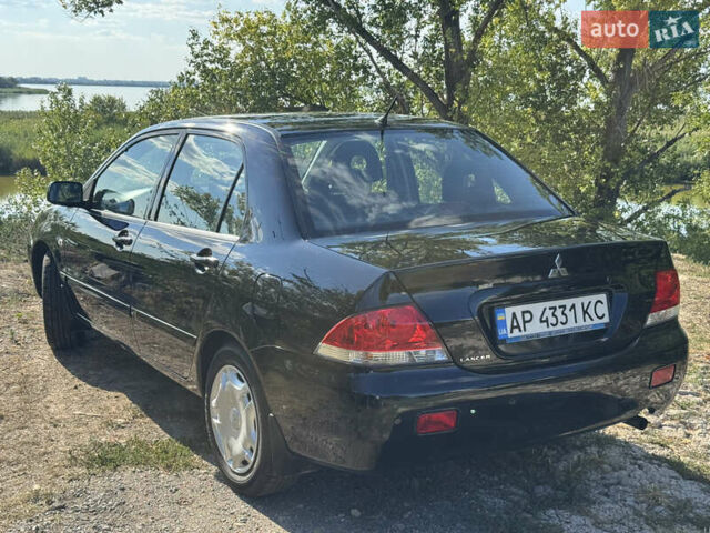 Міцубісі Lancer, об'ємом двигуна 1.6 л та пробігом 126 тис. км за 6199 $, фото 6 на Automoto.ua