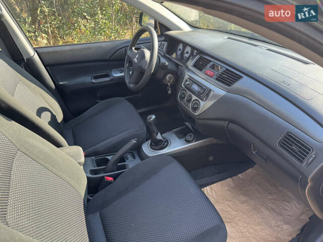 Міцубісі Lancer, об'ємом двигуна 1.6 л та пробігом 126 тис. км за 6199 $, фото 12 на Automoto.ua