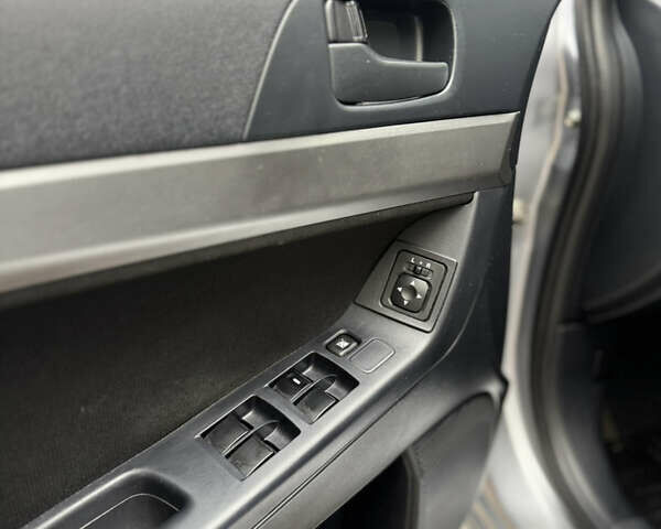 Міцубісі Lancer, об'ємом двигуна 2 л та пробігом 220 тис. км за 7450 $, фото 6 на Automoto.ua