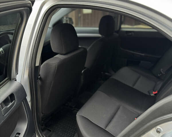 Міцубісі Lancer, об'ємом двигуна 2 л та пробігом 220 тис. км за 7450 $, фото 13 на Automoto.ua