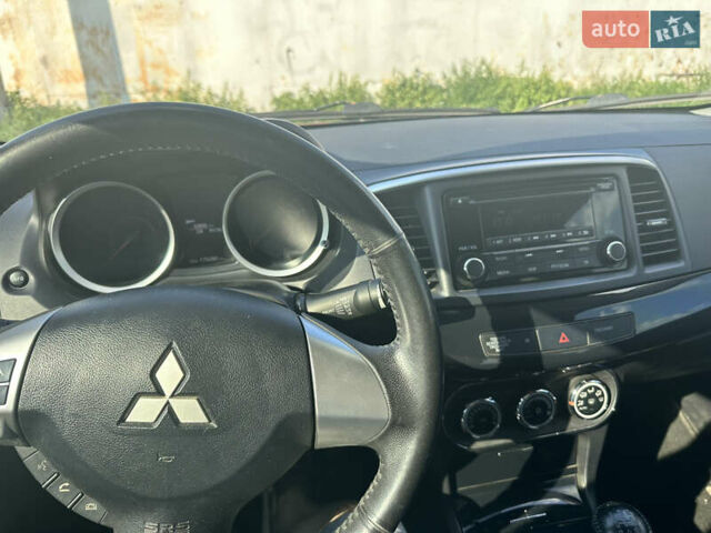 Мицубиси Лансер, объемом двигателя 1.6 л и пробегом 170 тыс. км за 8500 $, фото 5 на Automoto.ua