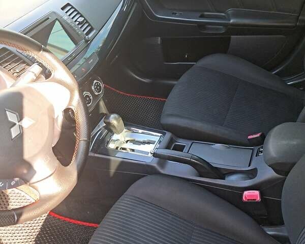 Міцубісі Lancer, об'ємом двигуна 1.59 л та пробігом 115 тис. км за 9000 $, фото 7 на Automoto.ua