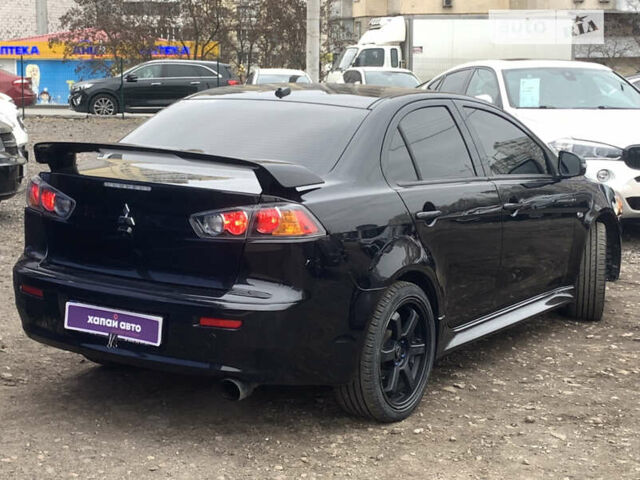 Міцубісі Lancer, об'ємом двигуна 2 л та пробігом 130 тис. км за 8320 $, фото 11 на Automoto.ua