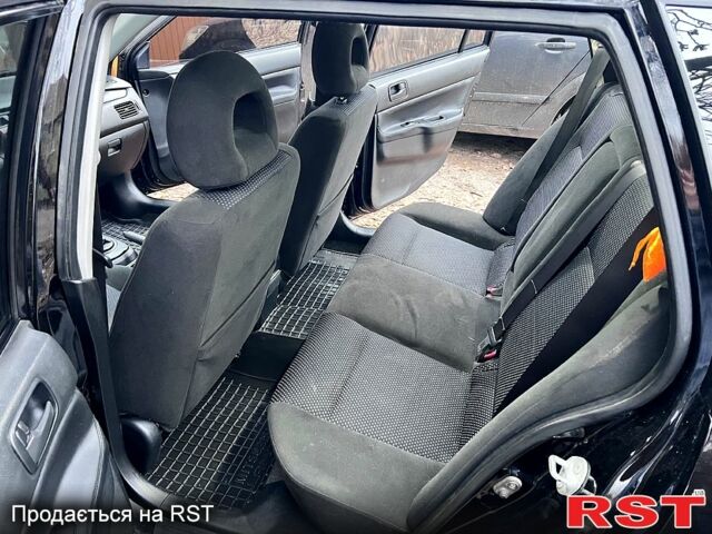 Мицубиси Лансер, объемом двигателя 1.6 л и пробегом 220 тыс. км за 5500 $, фото 8 на Automoto.ua