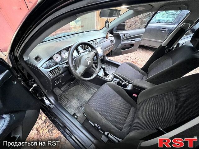 Мицубиси Лансер, объемом двигателя 1.6 л и пробегом 220 тыс. км за 5500 $, фото 5 на Automoto.ua