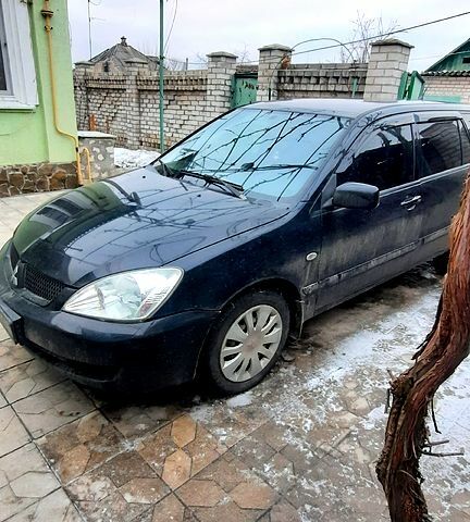 Міцубісі Lancer, об'ємом двигуна 1.6 л та пробігом 313 тис. км за 6000 $, фото 3 на Automoto.ua