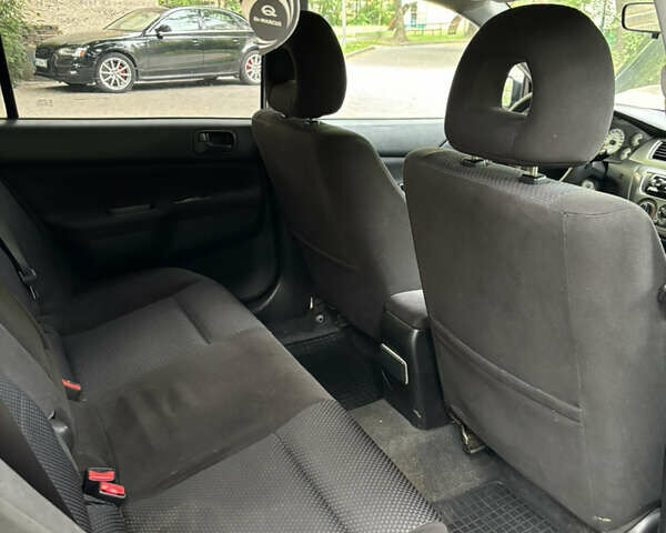 Мицубиси Лансер, объемом двигателя 1.58 л и пробегом 236 тыс. км за 4200 $, фото 21 на Automoto.ua