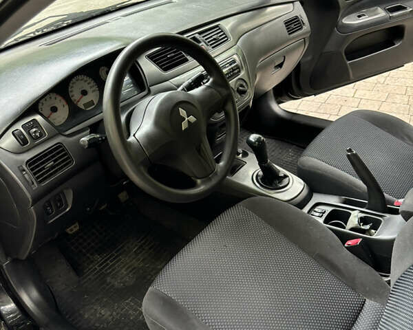 Мицубиси Лансер, объемом двигателя 1.58 л и пробегом 236 тыс. км за 4200 $, фото 16 на Automoto.ua