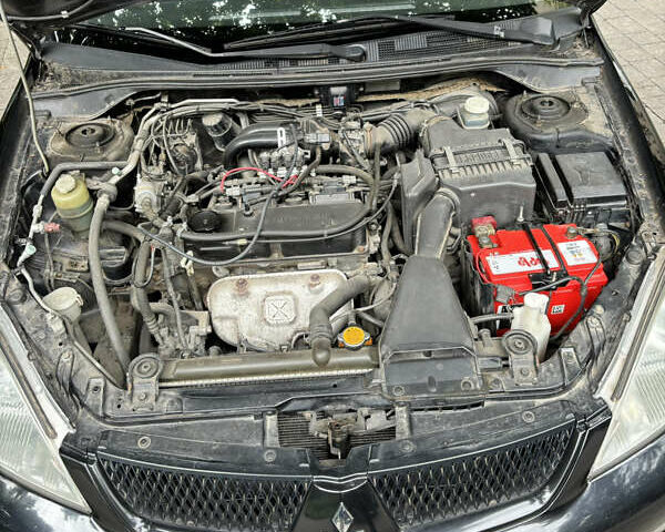 Мицубиси Лансер, объемом двигателя 1.58 л и пробегом 236 тыс. км за 4200 $, фото 13 на Automoto.ua