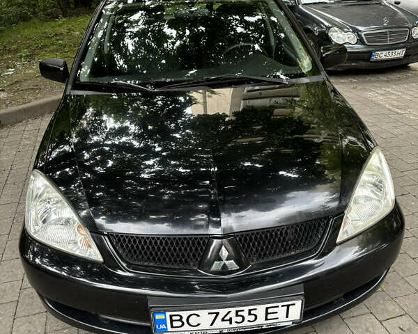 Мицубиси Лансер, объемом двигателя 1.58 л и пробегом 236 тыс. км за 4200 $, фото 12 на Automoto.ua