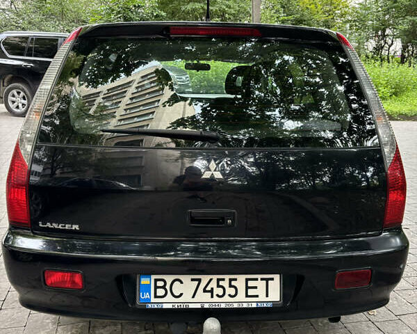Мицубиси Лансер, объемом двигателя 1.58 л и пробегом 236 тыс. км за 4200 $, фото 5 на Automoto.ua