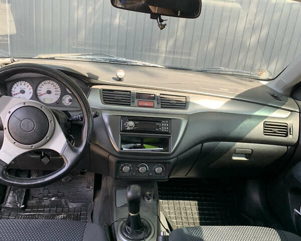 Мицубиси Лансер, объемом двигателя 1.6 л и пробегом 220 тыс. км за 4300 $, фото 9 на Automoto.ua