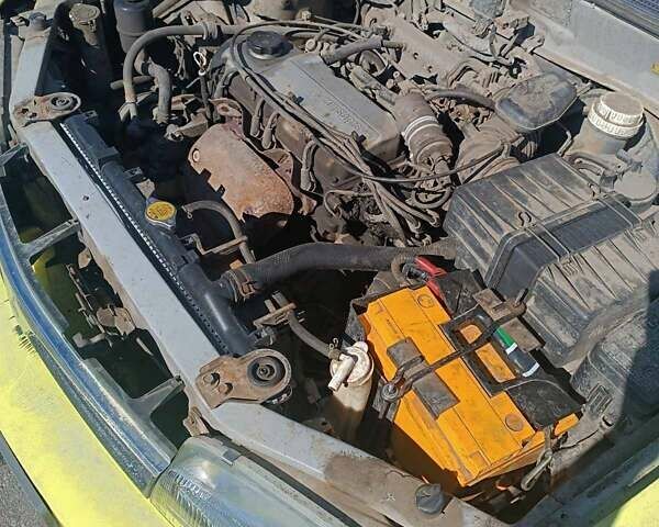 Жовтий Міцубісі Lancer, об'ємом двигуна 1.3 л та пробігом 306 тис. км за 1500 $, фото 13 на Automoto.ua