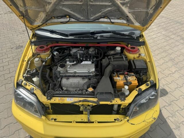 Жовтий Міцубісі Lancer, об'ємом двигуна 2 л та пробігом 262 тис. км за 3300 $, фото 4 на Automoto.ua