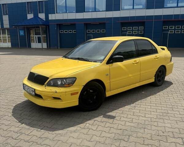 Мицубиси Лансер 2002 в Ивано-Франковске на Automoto.ua Желтый Мицубиси Лансер, объемом двигателя 2 л и пробегом 262 тыс. км за 3999 $, фото 4 на Automoto.ua
