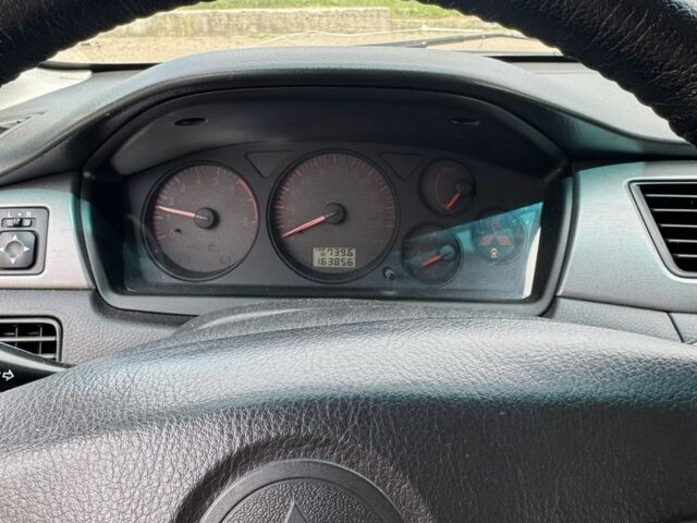 Жовтий Міцубісі Lancer, об'ємом двигуна 2 л та пробігом 262 тис. км за 3300 $, фото 6 на Automoto.ua