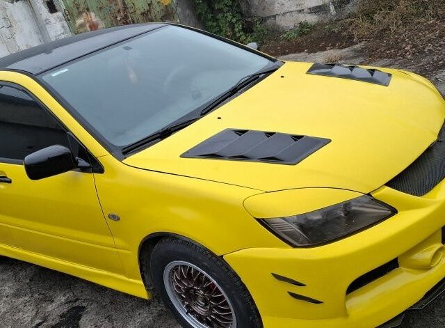 Жовтий Міцубісі Lancer, об'ємом двигуна 1.3 л та пробігом 380 тис. км за 3500 $, фото 1 на Automoto.ua