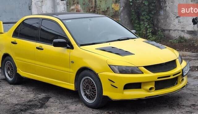 Желтый Мицубиси Лансер, объемом двигателя 1.3 л и пробегом 380 тыс. км за 3500 $, фото 15 на Automoto.ua