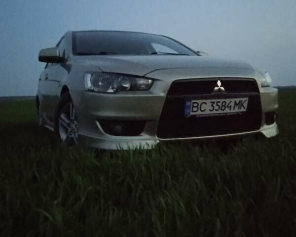 Жовтий Міцубісі Lancer, об'ємом двигуна 2 л та пробігом 175 тис. км за 6250 $, фото 2 на Automoto.ua