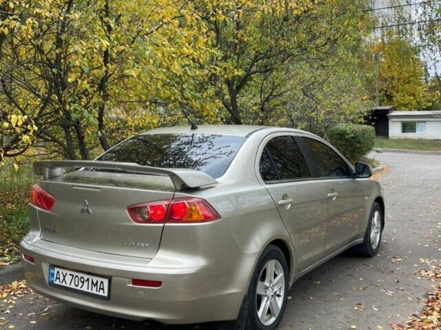 Желтый Мицубиси Лансер, объемом двигателя 1.5 л и пробегом 221 тыс. км за 5300 $, фото 4 на Automoto.ua