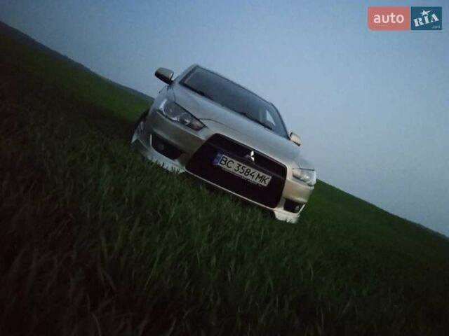 Жовтий Міцубісі Lancer, об'ємом двигуна 2 л та пробігом 175 тис. км за 7100 $, фото 6 на Automoto.ua