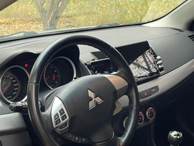 Желтый Мицубиси Лансер, объемом двигателя 1.5 л и пробегом 221 тыс. км за 5300 $, фото 6 на Automoto.ua