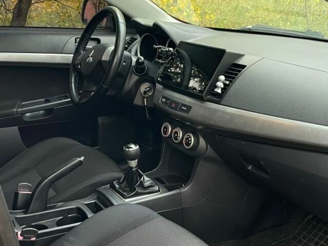 Желтый Мицубиси Лансер, объемом двигателя 1.5 л и пробегом 221 тыс. км за 5300 $, фото 7 на Automoto.ua