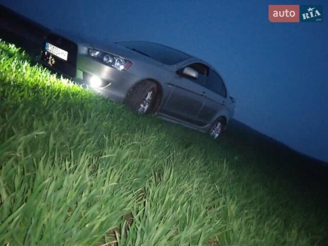 Жовтий Міцубісі Lancer, об'ємом двигуна 2 л та пробігом 175 тис. км за 6250 $, фото 8 на Automoto.ua