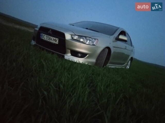 Жовтий Міцубісі Lancer, об'ємом двигуна 2 л та пробігом 175 тис. км за 7100 $, фото 3 на Automoto.ua