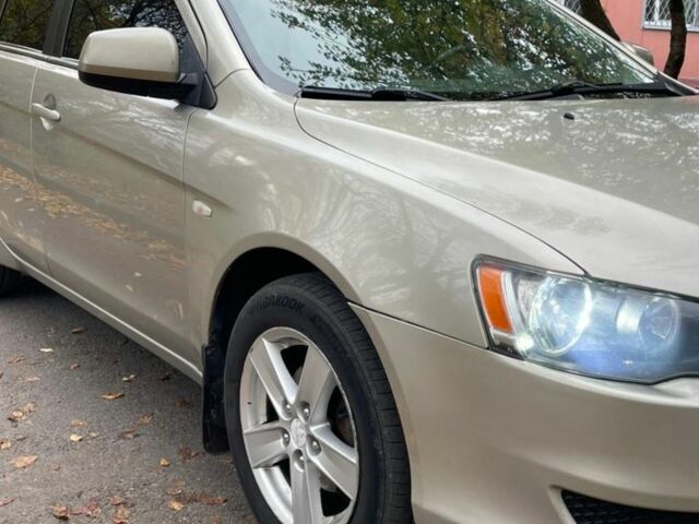 Желтый Мицубиси Лансер, объемом двигателя 1.5 л и пробегом 221 тыс. км за 5300 $, фото 2 на Automoto.ua