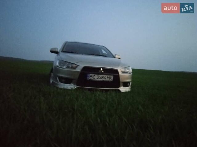 Жовтий Міцубісі Lancer, об'ємом двигуна 2 л та пробігом 175 тис. км за 6250 $, фото 5 на Automoto.ua