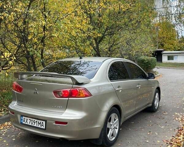 Желтый Мицубиси Лансер, объемом двигателя 1.5 л и пробегом 221 тыс. км за 5300 $, фото 3 на Automoto.ua