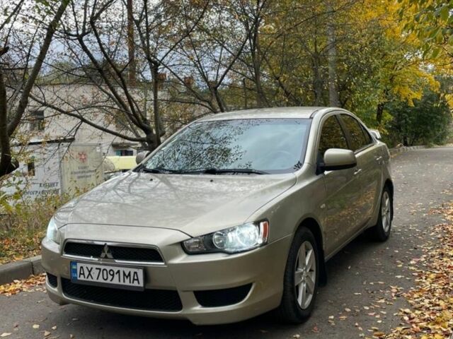 Желтый Мицубиси Лансер, объемом двигателя 1.5 л и пробегом 221 тыс. км за 5300 $, фото 1 на Automoto.ua