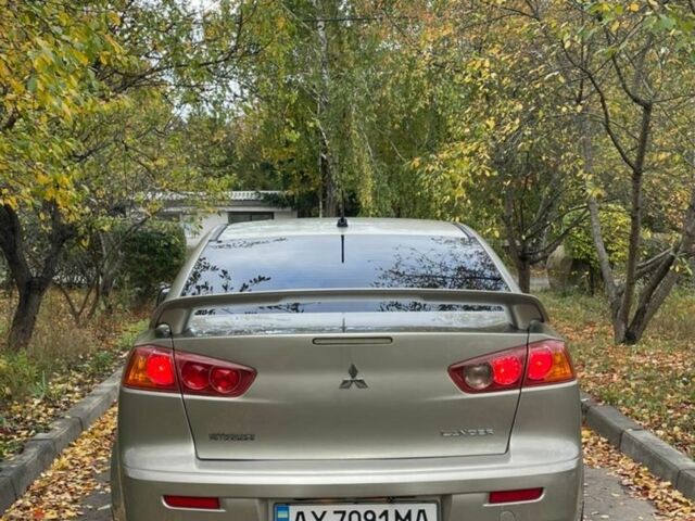 Желтый Мицубиси Лансер, объемом двигателя 1.5 л и пробегом 221 тыс. км за 5300 $, фото 3 на Automoto.ua