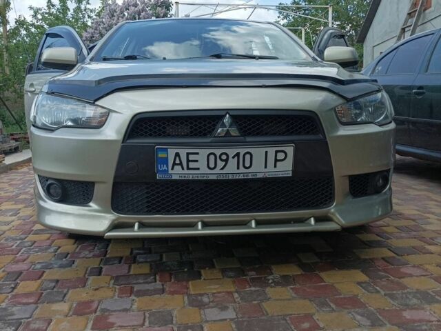 Желтый Мицубиси Лансер, объемом двигателя 2 л и пробегом 137 тыс. км за 7300 $, фото 1 на Automoto.ua