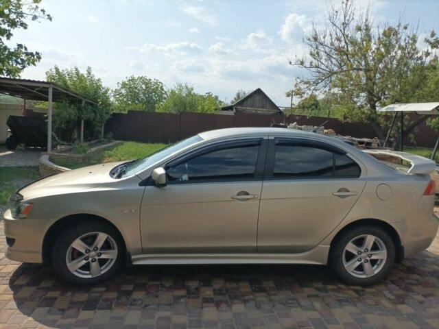 Желтый Мицубиси Лансер, объемом двигателя 2 л и пробегом 137 тыс. км за 7300 $, фото 4 на Automoto.ua