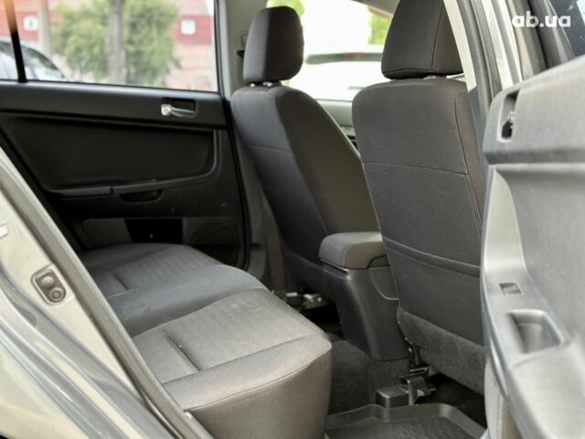 Серый Мицубиси Лансер, объемом двигателя 0 л и пробегом 154 тыс. км за 7600 $, фото 9 на Automoto.ua