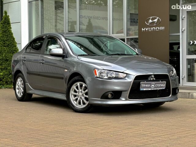 Серый Мицубиси Лансер, объемом двигателя 0 л и пробегом 154 тыс. км за 7600 $, фото 2 на Automoto.ua