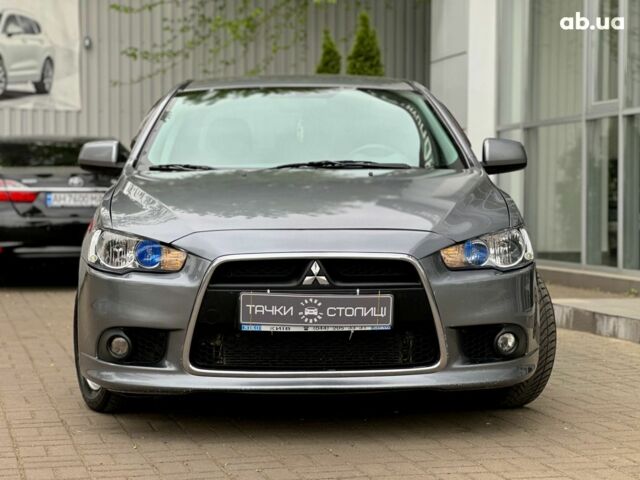 Серый Мицубиси Лансер, объемом двигателя 0 л и пробегом 154 тыс. км за 7600 $, фото 1 на Automoto.ua