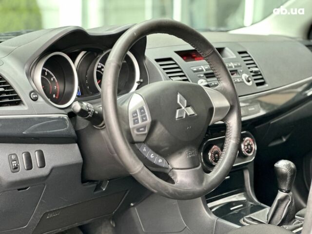 Серый Мицубиси Лансер, объемом двигателя 0 л и пробегом 154 тыс. км за 7600 $, фото 13 на Automoto.ua