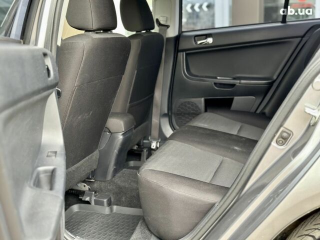 Серый Мицубиси Лансер, объемом двигателя 0 л и пробегом 154 тыс. км за 7600 $, фото 12 на Automoto.ua