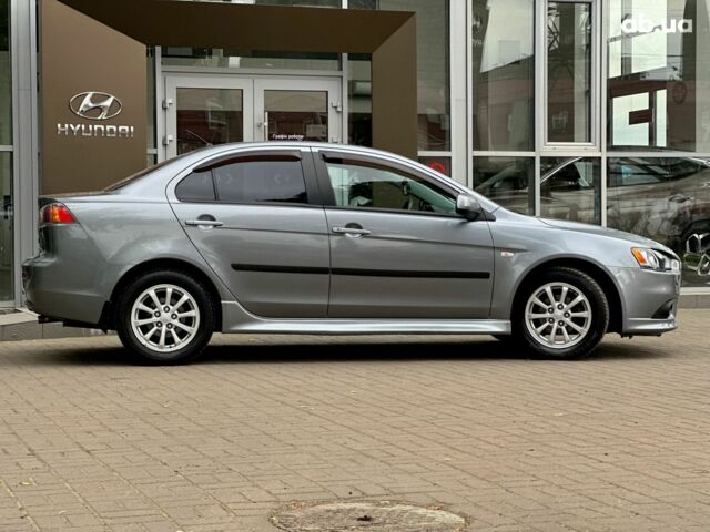 Серый Мицубиси Лансер, объемом двигателя 0 л и пробегом 154 тыс. км за 7600 $, фото 3 на Automoto.ua